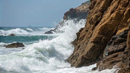 Close-up of rugged rock face with crashing waves and foamy surf, foam, wave crashes, geological textures, sea spray