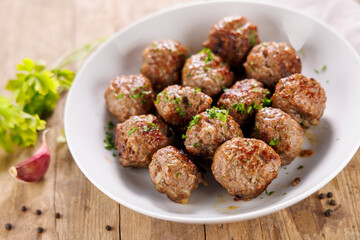 grilled roasted meatballs with herbs and spices