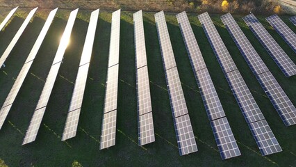 Sunlight gleaming on solar panel farm