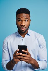 Portrait, young African American man, light blue button-up shirt, holding smartphone, surprised expression, raised eyebrows, studio lighting, blue background, clean aesthetic, high-resolution, profess
