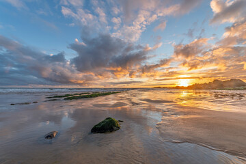 Atlantic Ocean beach at sunset.