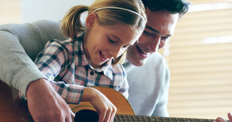 Guitar, learning and child with dad, lesson and family in home with music, development and creativity. Living room, musician and knowledge with love, support and bonding together on sofa with play
