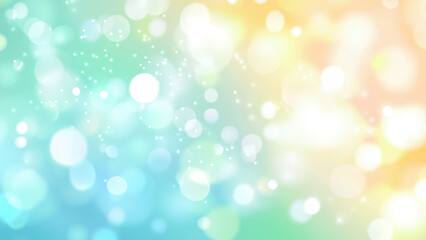 Soft, dreamy pastel bokeh background in shades of blue, green, and yellow.