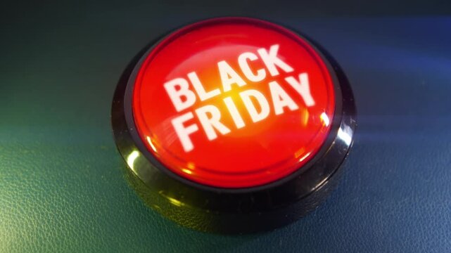 Pressing the big red button labeled with the message "Black Friday"