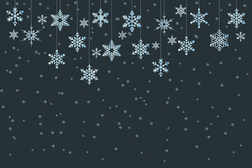 Snow flakes in gradient white and blue hanging and floating on dark blue background