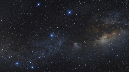 Obraz premium Vast night sky showcasing the Andromeda constellation, with five distinct stars forming the Cassiopeia pattern in the lower left corner amidst a sea of stars.