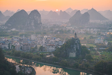 Aerial view of beautiful mountain and river natural landscape in Guilin, China. Guilin is a world famous tourist resort. Here are the most widely distributed karst landforms in China.