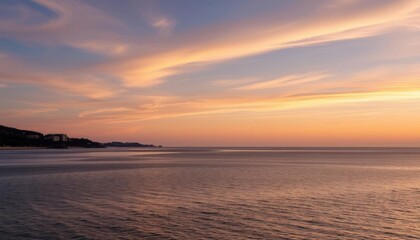 view of a beach with a boat in the water, fades to the horizon