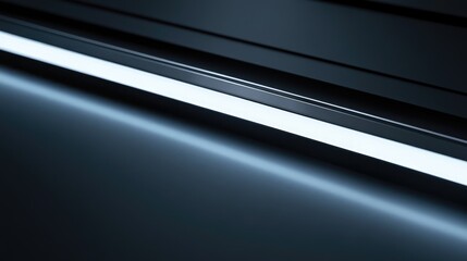 Futuristic minimalistic backdrop featuring a glowing neon light on a sleek black metallic surface, enhancing depth and elegance.