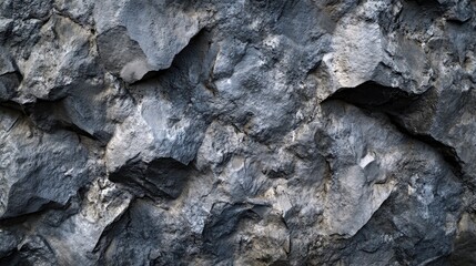 Fototapeta premium Textured gray cement stone surface featuring rough, uneven layers and a bright finish, perfect for panoramic backgrounds or banners.