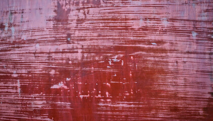 Abstract Red Painted Metal Texture with Rustic Brush Strokes and Weathered Patterns