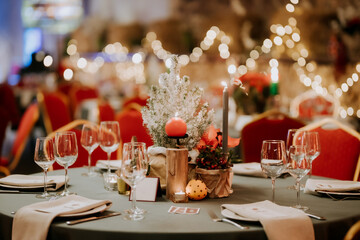 Elegant Christmas Table Setting with Festive Centerpiece