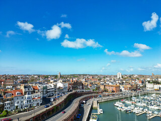 Fototapeta premium High Angle View of Beautiful British Tourist Attraction of Great Britain at Ramsgate Beach and Ocean City of Kent, England United Kingdom. Drone's Camera Footage Captured on April 21st, 2024