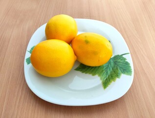 Yellow lemons on the table