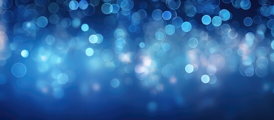 Blue bokeh lights background shimmering sparkles festive decoration for discounts sales promotions cheerful atmosphere elegant design