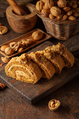 Cake with brown sugar, walnuts, and cream.