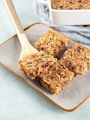 Baked oatmeal peanut butter banana cake bars with chocolate chips