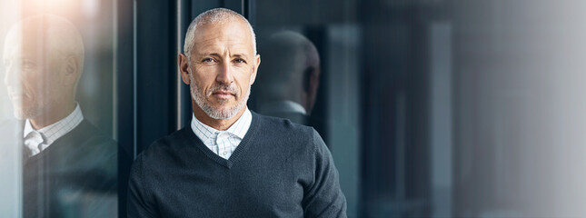 Business man, portrait and serious in office with ceo, banner and mockup of property developer. Real estate, about us and confidence of mature professional with investment opportunity and ambition