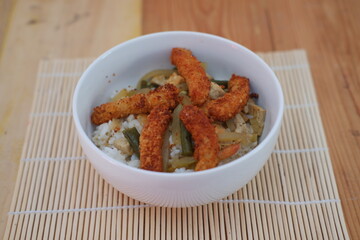 rice and pumpkin vegetables with chicken nuggets