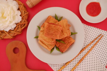 Tahu Bakso, Indonesian traditional snack made from tofu and beef. Served in white plate.