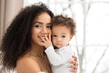 Love of a mother and child, baby. Family at home. Lifestyle