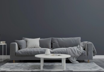 A modern living room with a grey sectional sofa. a round coffee table. and a large black wall. perfect for showcasing your products