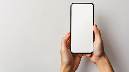 Close-up photo of Santa Claus�s hand holding a key, isolated against a red background.