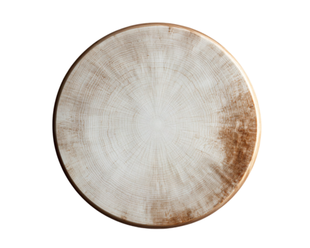 a white plate with brown specks