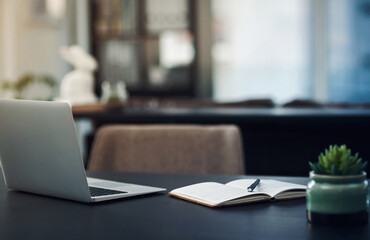 Office, desk and notebook with laptop for connection, research information and online website for...