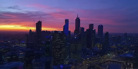 Fototapeta premium Modern City Skyline with Office Buildings and Drone View at Sunset