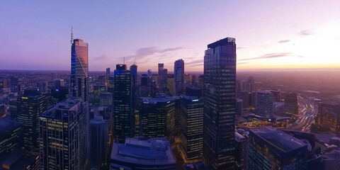Fototapeta premium Modern City Skyline with Office Buildings and Drone View at Sunset