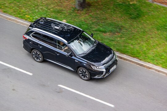 Mitsubishi Outlander SUV crossover car with motion blur effect
