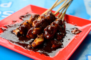 Sate or Satay Grilled Indonesian Chicken Skewers Bali Style with Spicy Peanut Sauce