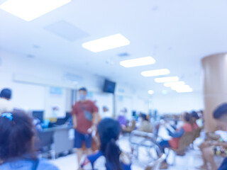Background blurred hospital. Blurred hospital interior, patients talking to nurses. Patients waiting to see a doctor, information center, reception and patient care. people and maintenance. Medical 