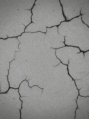 Fototapeta premium Rough gray stony texture with cracks and crevices, layered