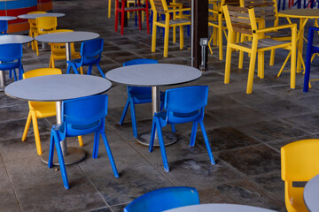 Colorful seating arrangement in a modern hotel cafe in Turkiye during daytime hours