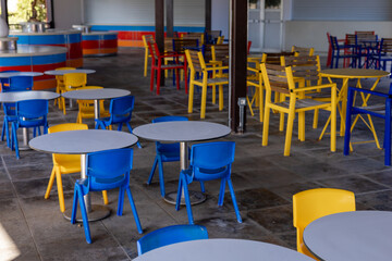 Colorful seating arrangement in a modern hotel cafe in Turkiye during daytime hours