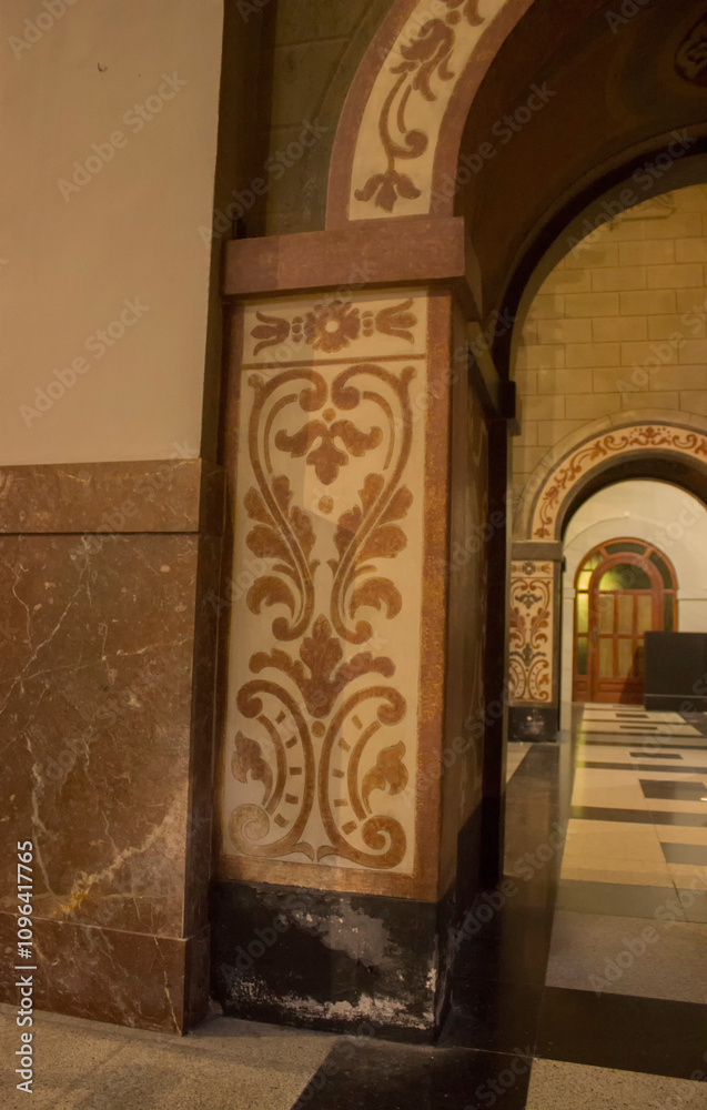 Wall mural arched tunnel in the walls of the building, the walls are decorated with drawings