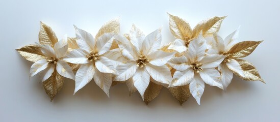 Elegant gold and white faux poinsettias arranged beautifully for festive decor and holiday celebrations