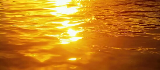 Golden Sunset Reflection on Water High Resolution Capture of Sunlight Over Rippling Waves at Beach with DSLR Camera