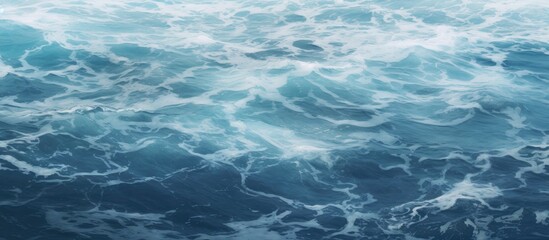 Ocean surface texture with gentle waves and foamy white patterns in shades of blue and turquoise for natural backgrounds and designs