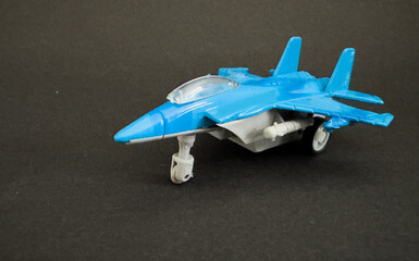 Model plane isolated on the dark background