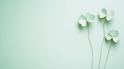 green background with small paper cut-out of shamrocks