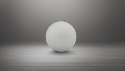 둥근 흰색 공이 매끄러운 바닥 위에 놓여있는 장면