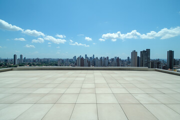 Obraz premium Empty Rooftop with City Skyline and Clear Blue Sky