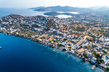 Yalikavak Bay of Bodrum. Mugla, Turkey. Panoramic view of Yalikavak marina and beach. Drone shot.