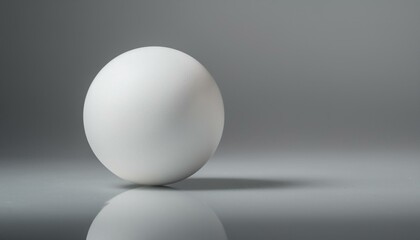 둥근 흰색 공이 매끄러운 바닥 위에 놓여있는 장면