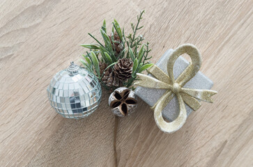 A beautiful vertical scene featuring wrapped gifts and elegant ornaments. This festive composition includes ribbons, baubles, and greenery, embodying the joyful essence of the Christmas season