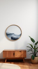 Minimalist living room with wooden cabinet, a plant, and a framed art piece.