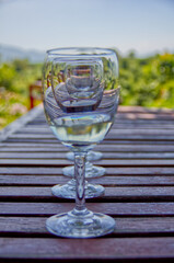 Line of glasses of wine on a table